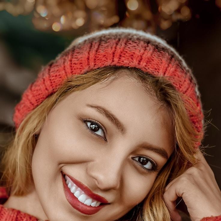 Kaveri Mehta, Lead Design Curator at SmallHarborBag, reviewing corporate floral arrangements